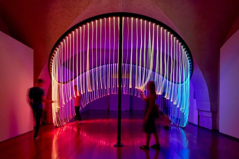 Optical fibers can be pulled into you and me by the artist's hand